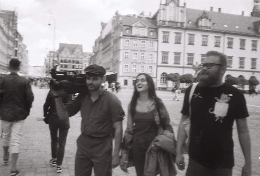 Tyko Say, Sandra Pasławska, and Jaromír Lelek scouting venues for OBJECT:PARADISE's first international language happening. Krakow, Poland, 2022. Photo by Hunter Andrews.