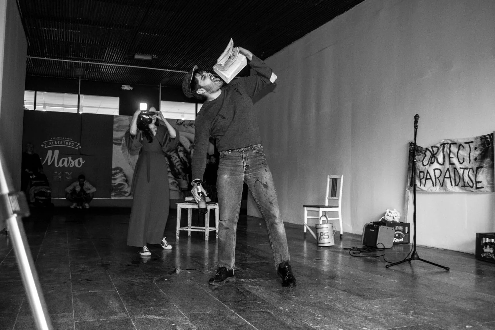 Tyko Say drinking the dictionary at Excuse me, Žižkov (Photo by Jan Černý)