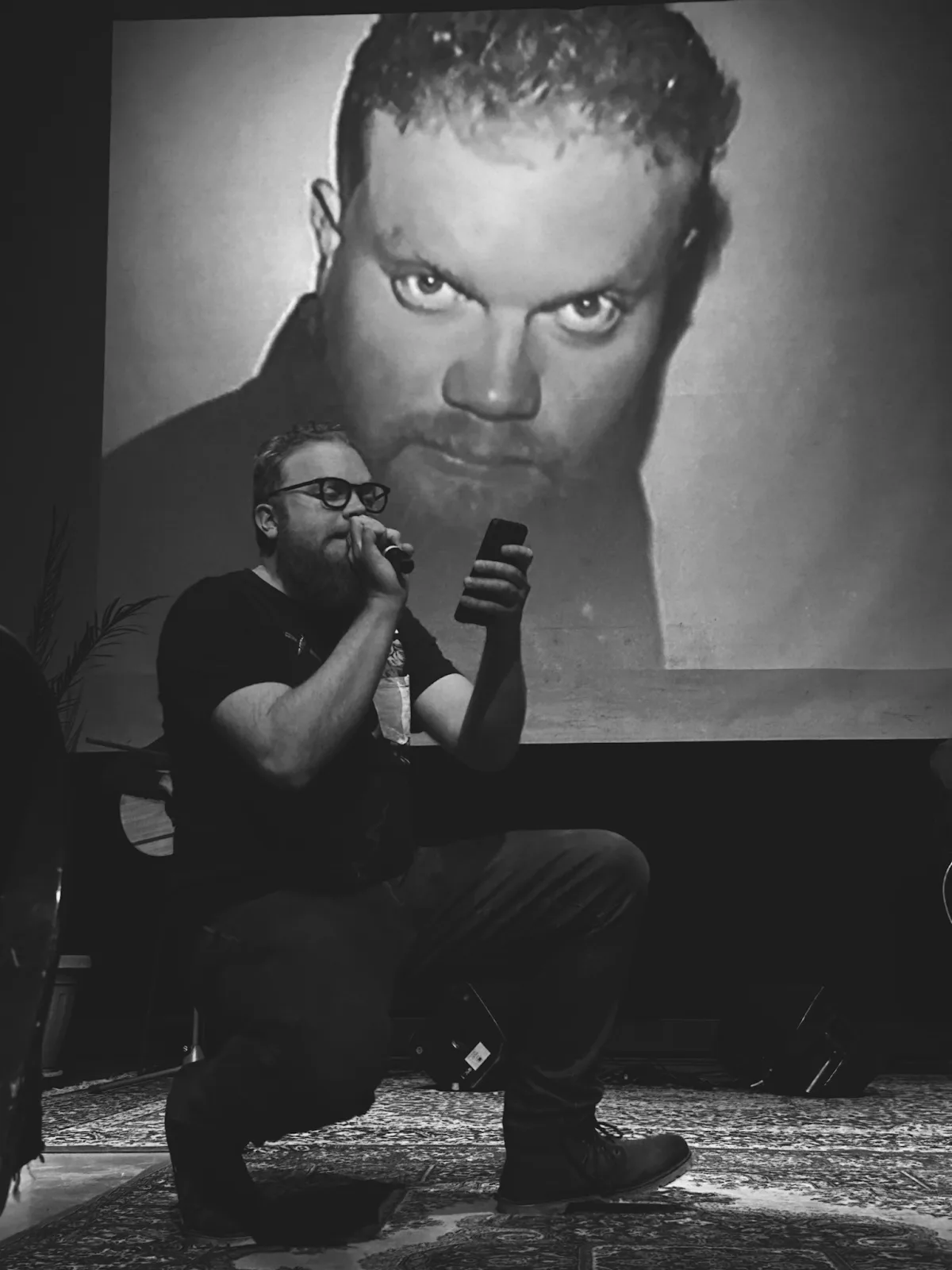 Jaromír Lelek reading w/ live projection of the Prague Tapes at Tabačka Kulturfabrik (January 2024) Photo by Katka Rybárová