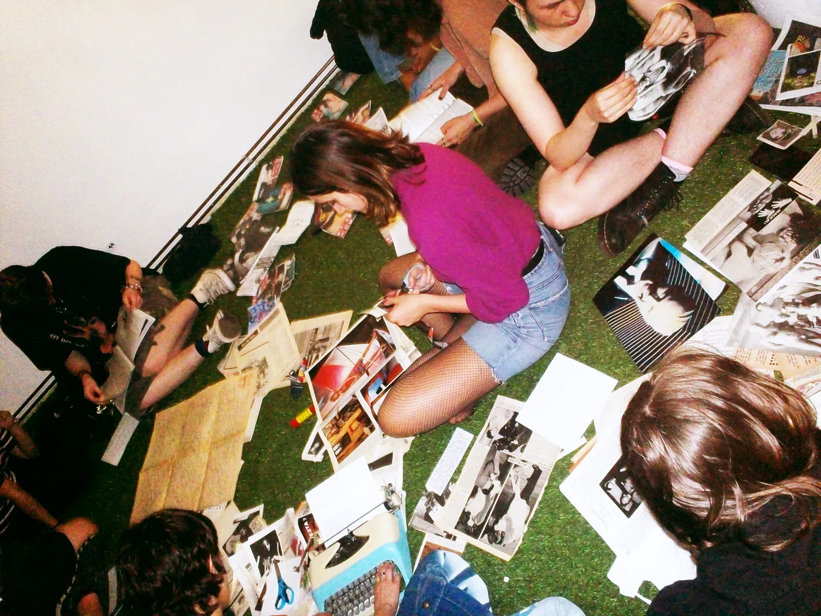 OBJECT:PARADISE community members hand-assembling an issue of KROTCH Magazine