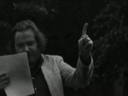 Ásgeir H Ingólfsson reading in the park