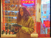 Sandra Pasławska Reading in front of the Potraviny